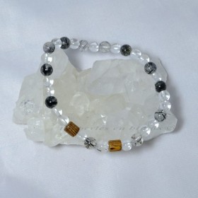 Bracelet Pia en quartz rutilé, cristal de roche et bois – bijou naturel, énergétique et fait main dans le Cotentin.