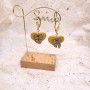 Gloria – Boucles pendants cœurs dorés et nœud strass